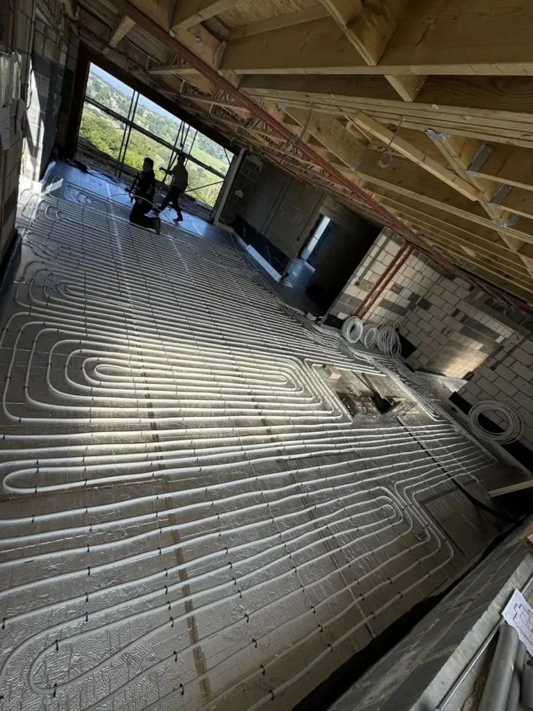 underfloor heating pipes laid in a Cheltenham building site