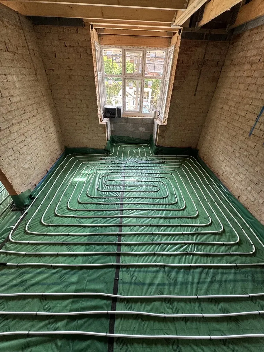underfloor heating pipes organised into a corner