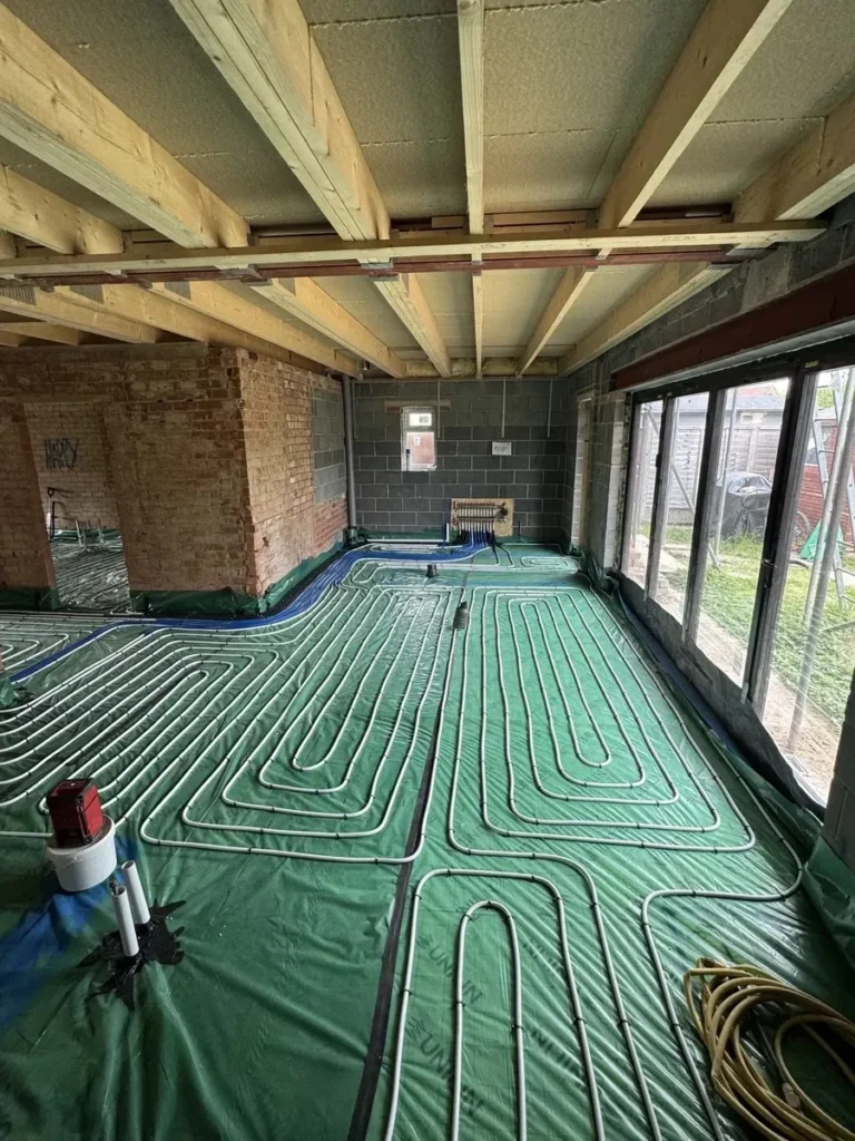Underfloor heating installed with control board in view
