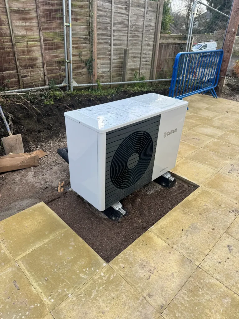 small air source heat pump in a Tewkesbury garden
