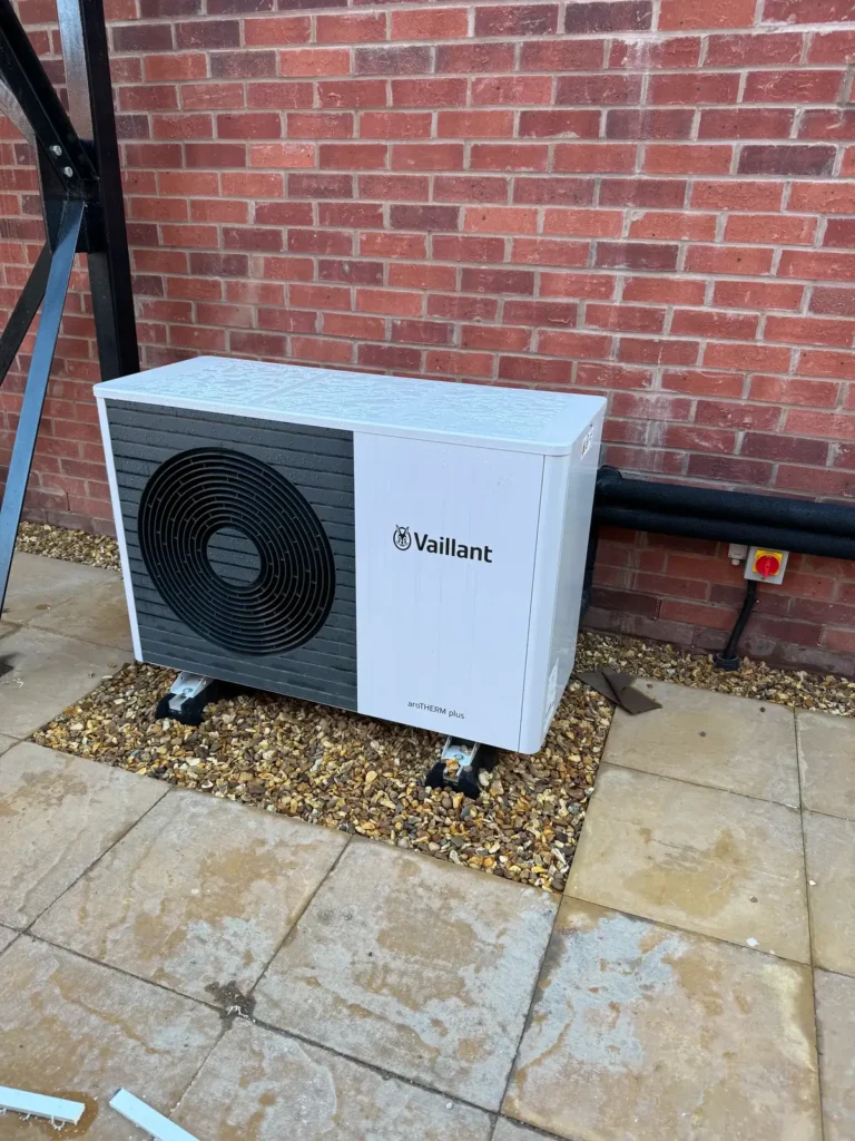small air source heat pump on the patio on a Gloucester home